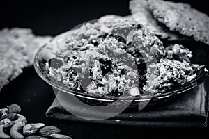 Halwa of Lagenaria siceraria,bottle guard[Dudhi ka halwa] an Indian sweet dessert served before or after lunch with dry fruits li photo