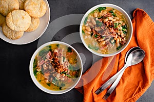 Ham Bone Soup with White Beans and Kale Served with Buttermilk Biscuits