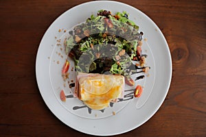 Ham cheese sandwich with salad on a plate