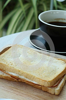 Ham cheese sandwich on wood tray and space for write wording