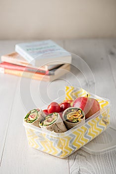 Ham and cheese wraps in lunch box