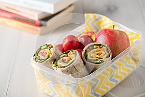 Ham and cheese wraps in lunch box