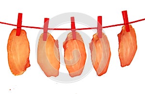 Ham dried meat drying on clothes line