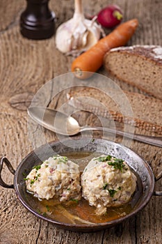 Ham dumplings in broth