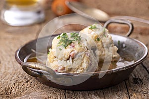 Ham dumplings in broth