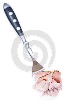 Ham on a fork (isolated on white)