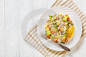 Ham and Noodle Casserole on white plate, top view