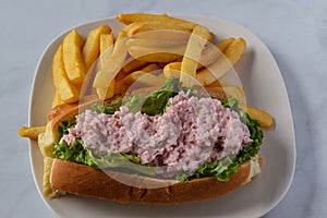 Ham salad roll with fries