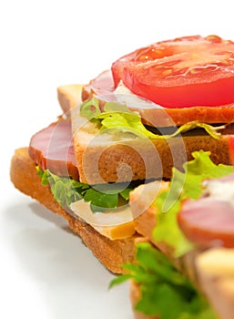 Ham sandwich with cheese, tomatoes and lettuce