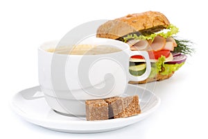 Ham sandwich and cup of coffee