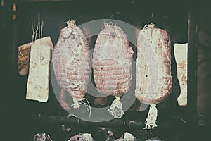 Ham, sausage in a homemade smokehouse