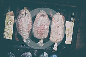 Ham, sausage in a homemade smokehouse