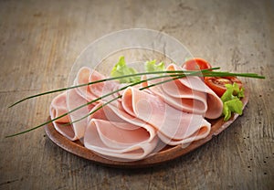 Ham slices on plate