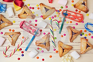 Hamantaschen cookies with candy. View from above