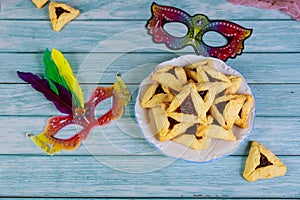 Hamantashen jewish cookies with masks for carnival