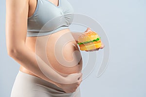 Hamberger junk food and pregnant woman is not good healthy for mother and infant