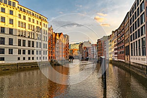 Hamburg. Canal and houses in Speicherstadt warehouse district at sunset. Germany. Popular tourist destination