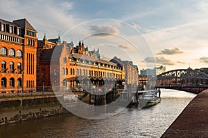 Hamburg cityscape. Speicherstadt warehouse district along the Elbe river at sunset. Germany.