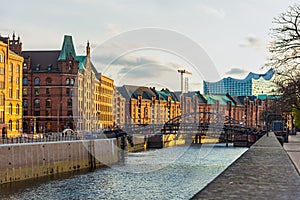 Hamburg. Historic Speicherstadt warehouse district along the canal at sunset. Germany.