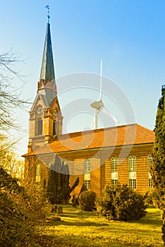 Hamburg, old church of Altenwerder and wind engine