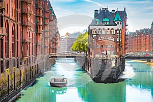 Hamburg Speicherstadt warehouse district with sightseeing boat