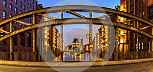 Hamburg Wasserschloss Castle Speicherstadt panoramic view at night in Germany