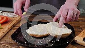 Hamburger bun with sesame seeds on top