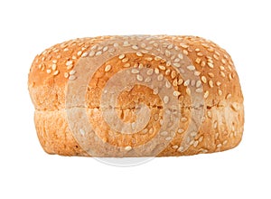 Hamburger bun sprinkled with sesame seeds isolated on a white background. Close up