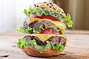 Hamburger closeup on a wooden kitchen table