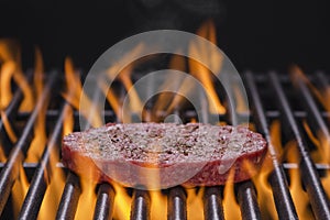 Hamburger Cooking on a Flaming Grill