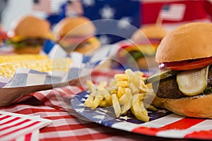 Hamburger and french fries on plate