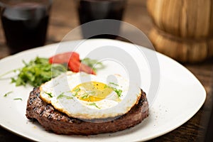 Hamburger with fried egg closeup