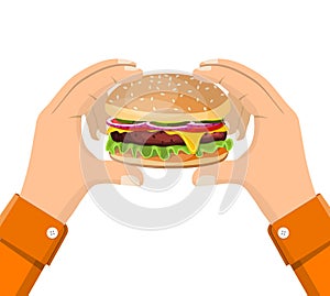 Hamburger holding in hand, Eating fast food concept.