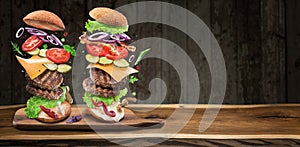 Hamburger ingredients falling down one by one to create a perfect meal. Colorful conceptual picture of burger cooking