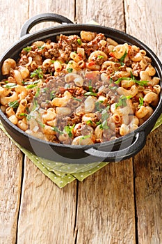 Hamburger and Macaroni closeup in the pan. Vertical