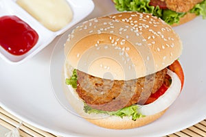 hamburger with meat on white dish