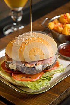 hamburger with potatoes and sauce