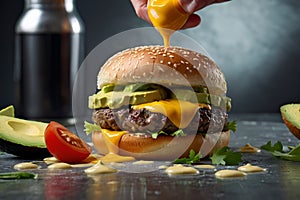 a hamburger with a tomato on it is being poured into a container Avocado Infusion Crafting