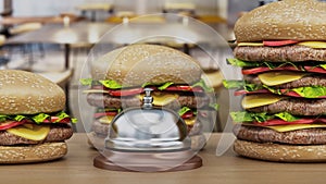 Hamburgers and service bell standing on the burger shop counter. 3D illustration