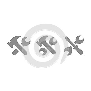 Hamer, wrench and screwdriver crossed vector icon set