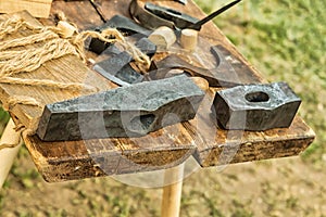 Hammer and ax black iron head base heavy builder work tool