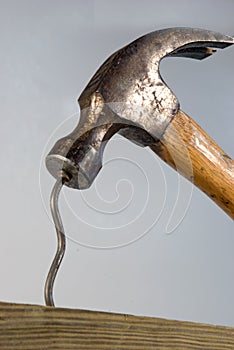 Hammer and bent nail