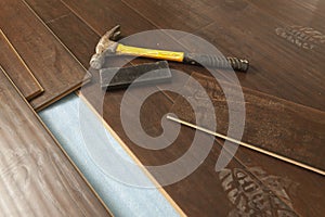 Hammer and Block with New Laminate Flooring