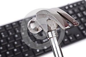Hammer and computer keyboard