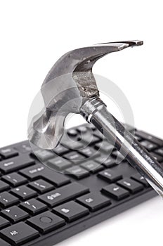 Hammer and computer keyboard