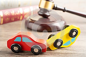 Hammer gavel judge with car vehicle accident, insurance coverage claim lawsuit court case