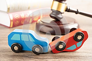 Hammer gavel judge with car vehicle accident, insurance coverage claim lawsuit court case