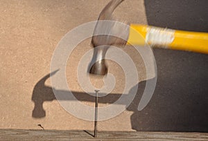 Hammer hitting nail