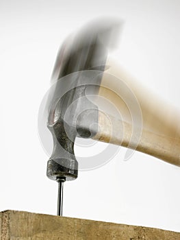 Hammer hitting nail