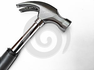 Hammer isolated on white background. Hammer and nail puller, two in one. Close up of a Hammer with a rubberized handle.